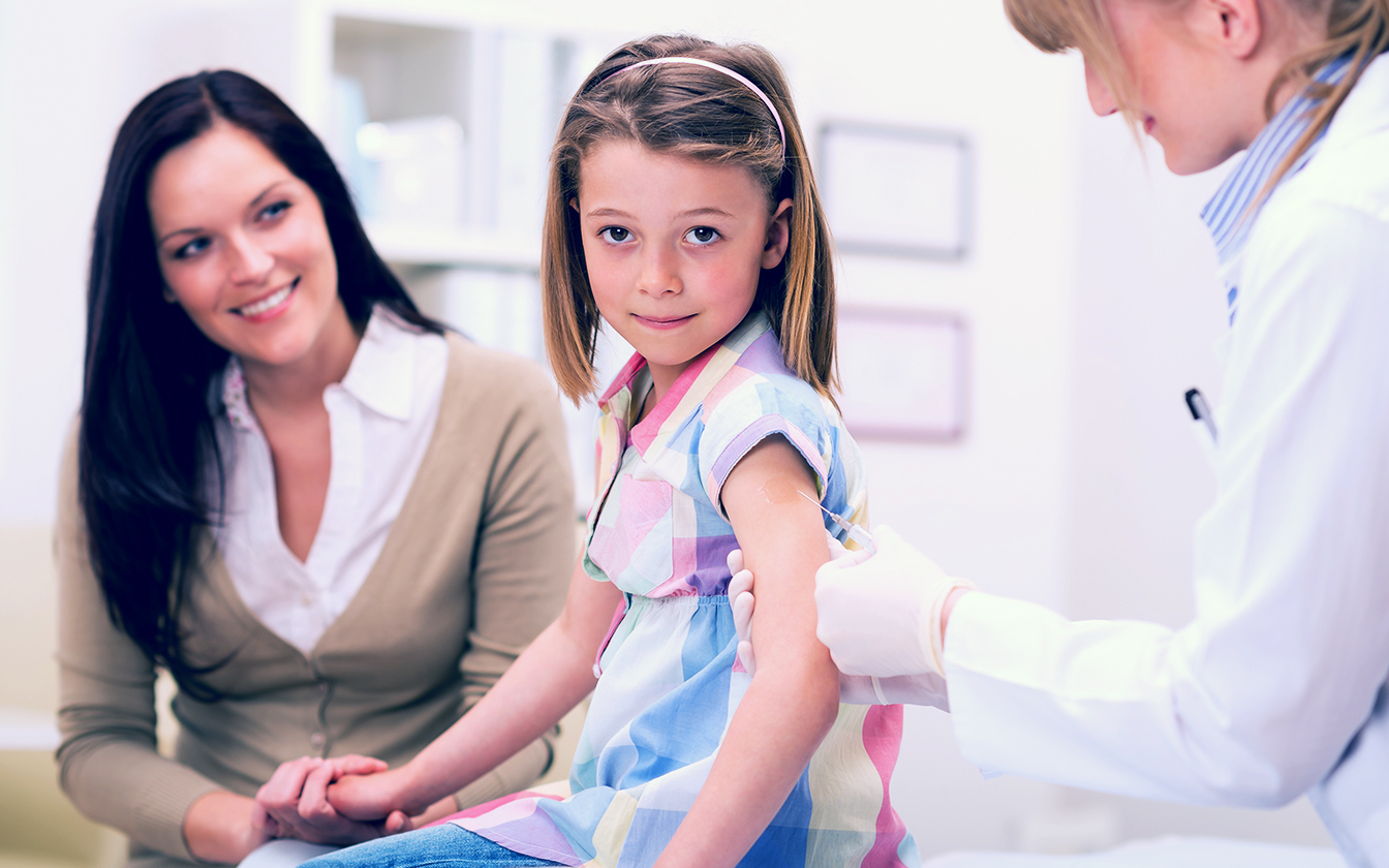 child receiving vaccination